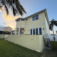 Bright-and-Light-Exterior-Painting-Intercoastal-Home-in-Hollywood-Florida 1